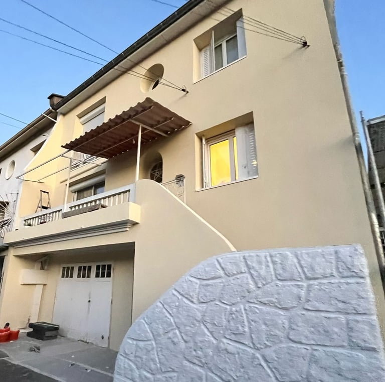 a large white mattress on a building with a large white mattress