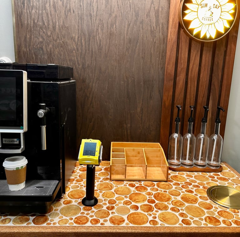 a coffee maker with a coffee maker and a coffee maker
