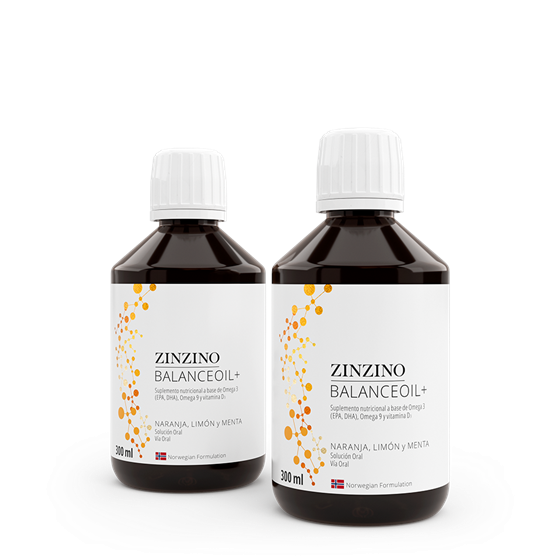 Two amber bottles of Zinzino BalanceOil+ omega-3 supplement with orange, lemon, and mint flavors.