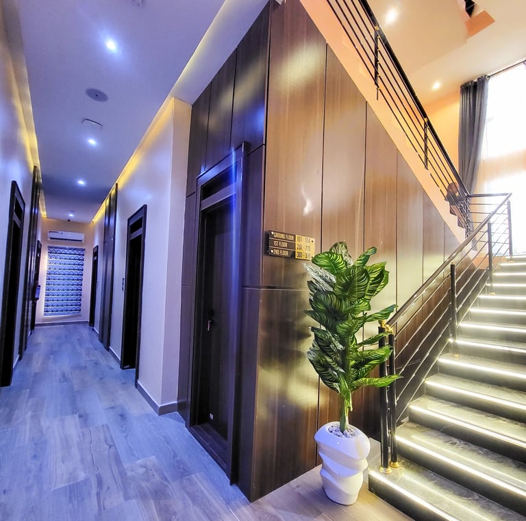 Elegant hotel lobby with plush seating and modern lighting.