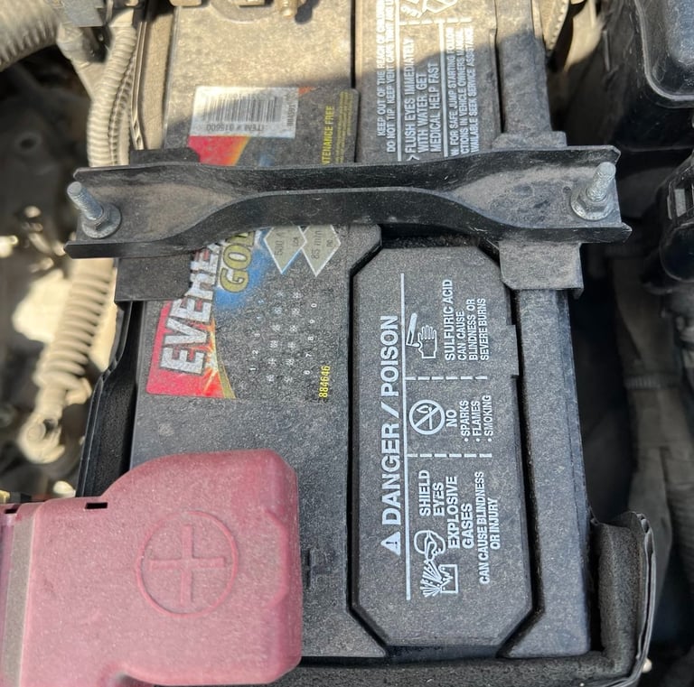 a car battery box with a battery and a battery