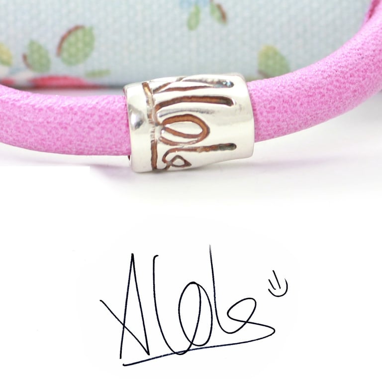 A Pandora compatible tube bead with your child's handwritten name on.