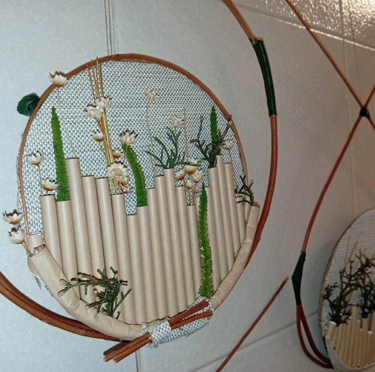 a wall hanging with a picture of a flower