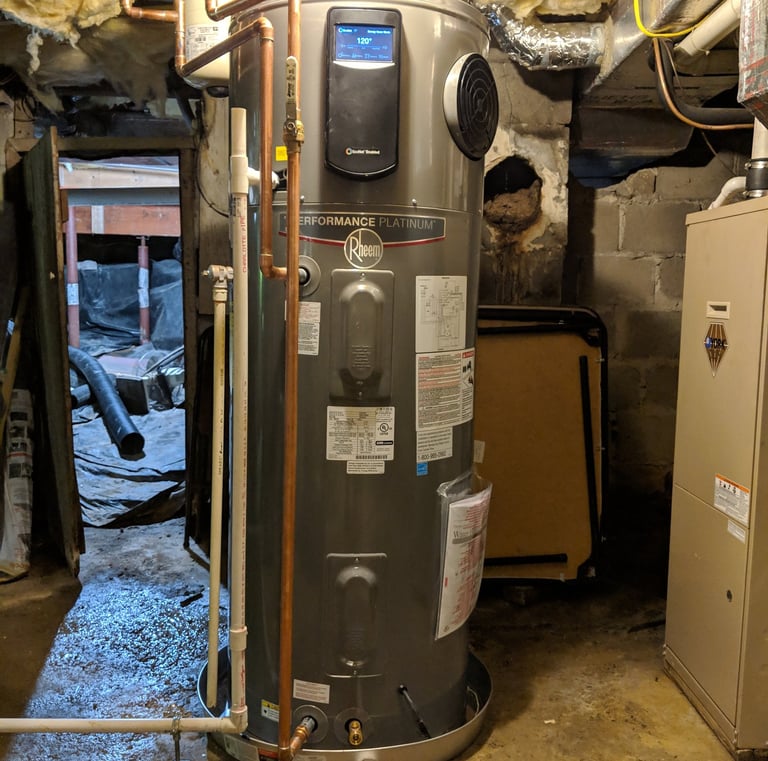 Energy-efficient hybrid water heater professionally installed by WaterHeatersNearMe.pro in Montgomery County MD