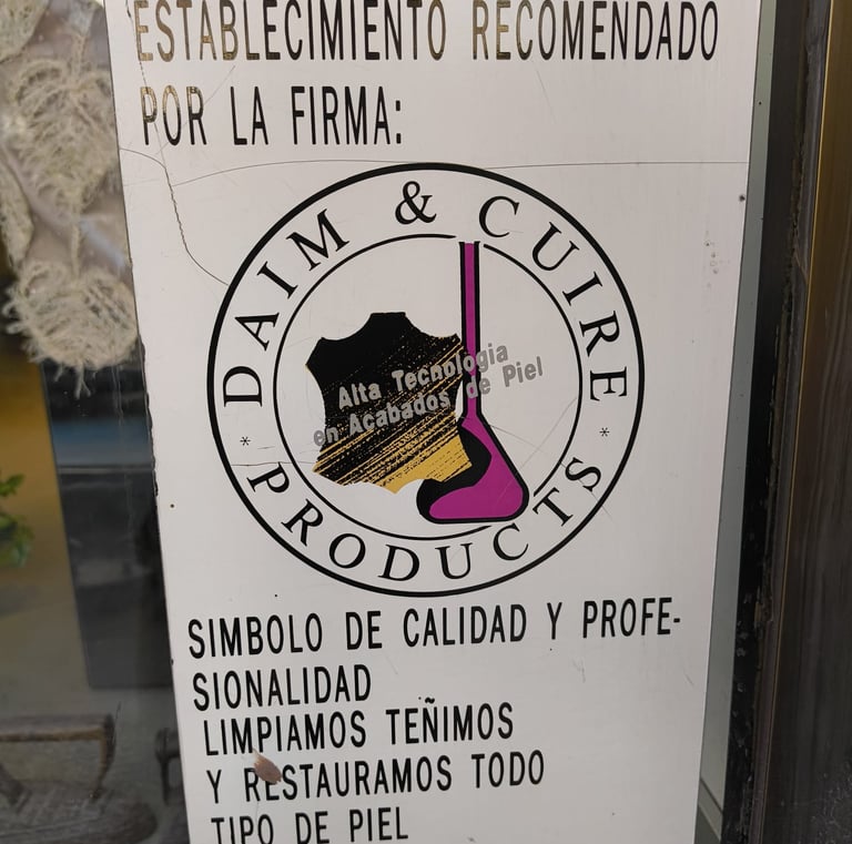 a sign that says that we're specialists in cleaning leather and skins