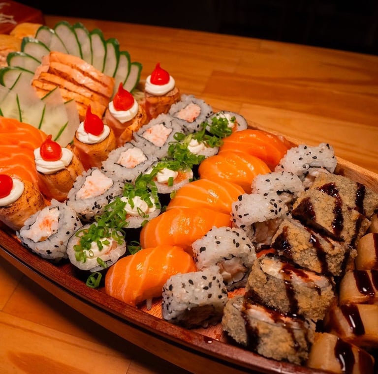 a long boat shaped plate with sushi and sushi