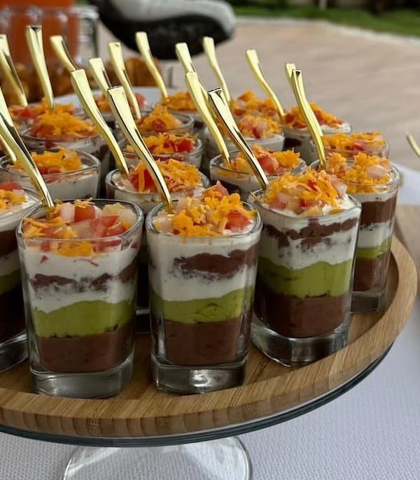a tray of desserts with a variety of desserts