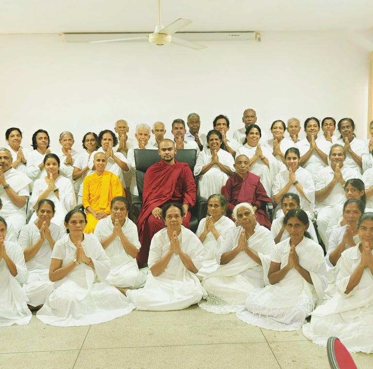 a group of people standing in front of a room