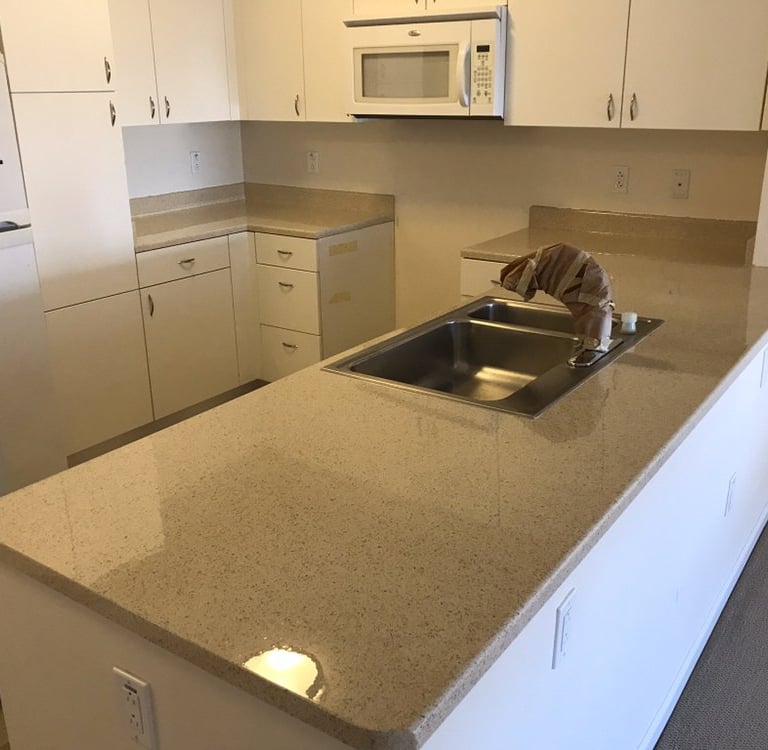 Expert refinishing of cracked bathroom countertop