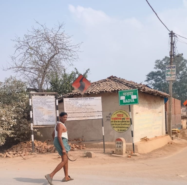 a man front of sign board