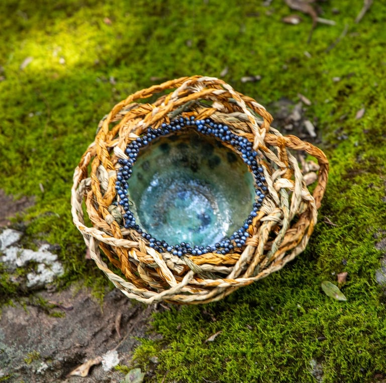 Small ceramic bowl, woven, naturally dyed raffia with glass beads