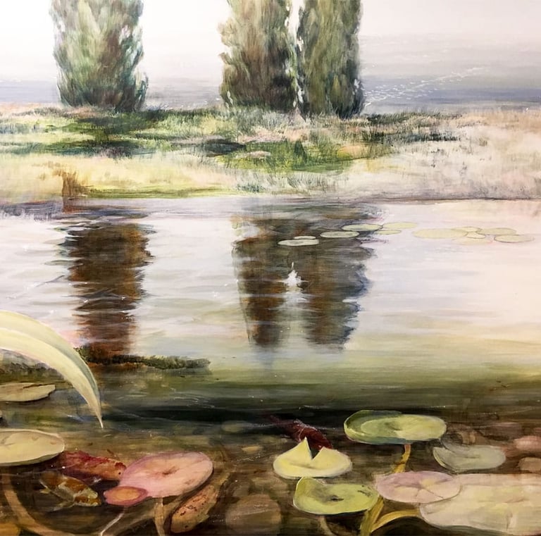 Close up showing the cypress trees within the waters reflection.