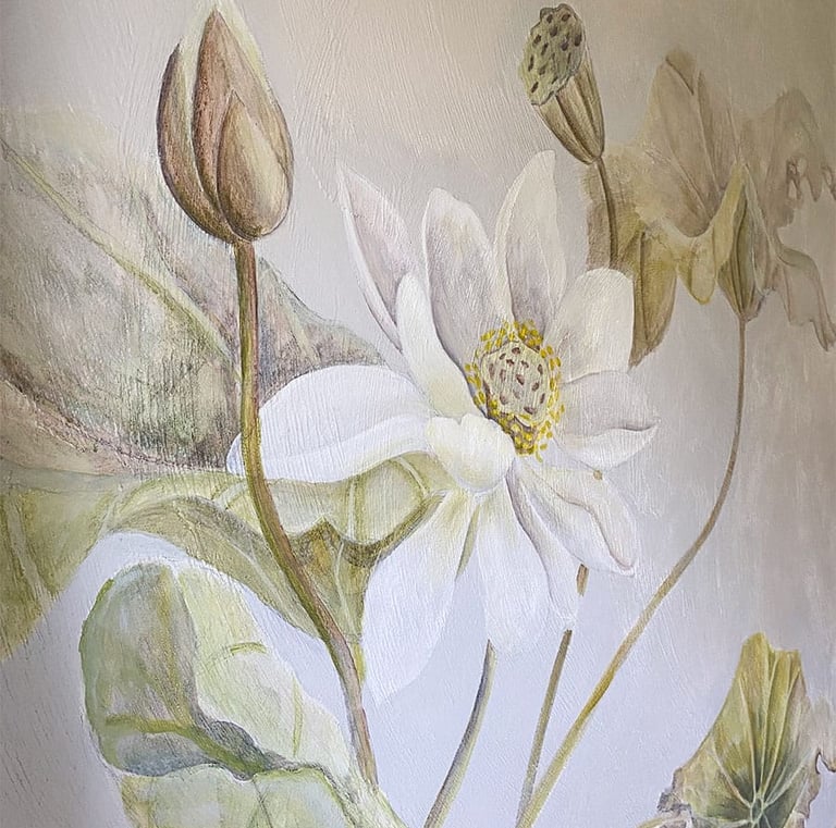 Close-up on a mural with a large lotus flower and large lily pads, painted in a watercolour effect.