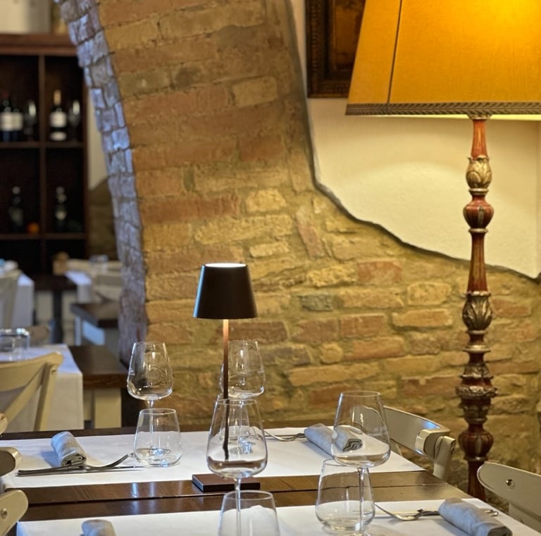 a table with a lamp and a lamp on it