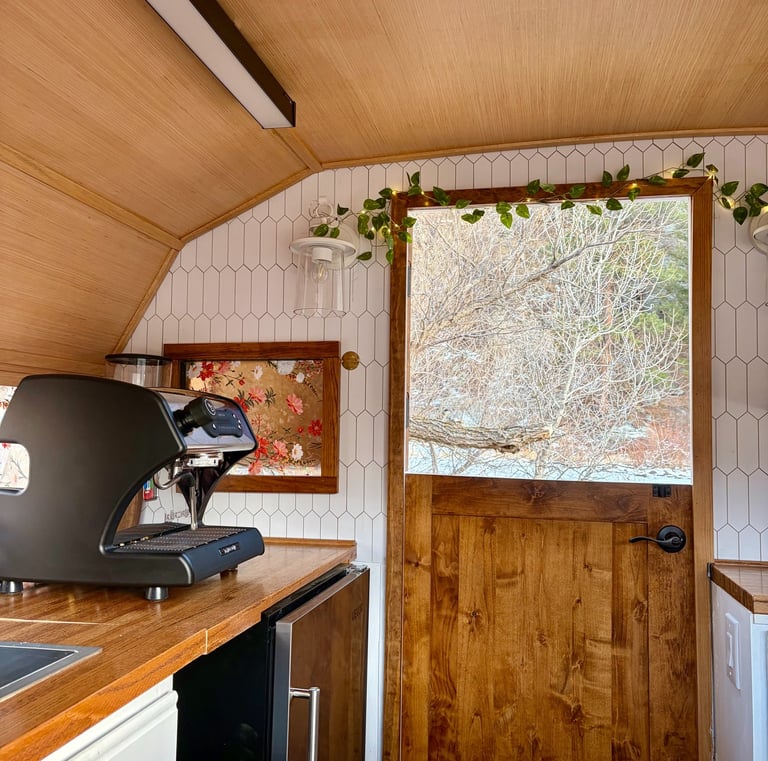 Love & Lattes coffee trailer serving guests at community celebration