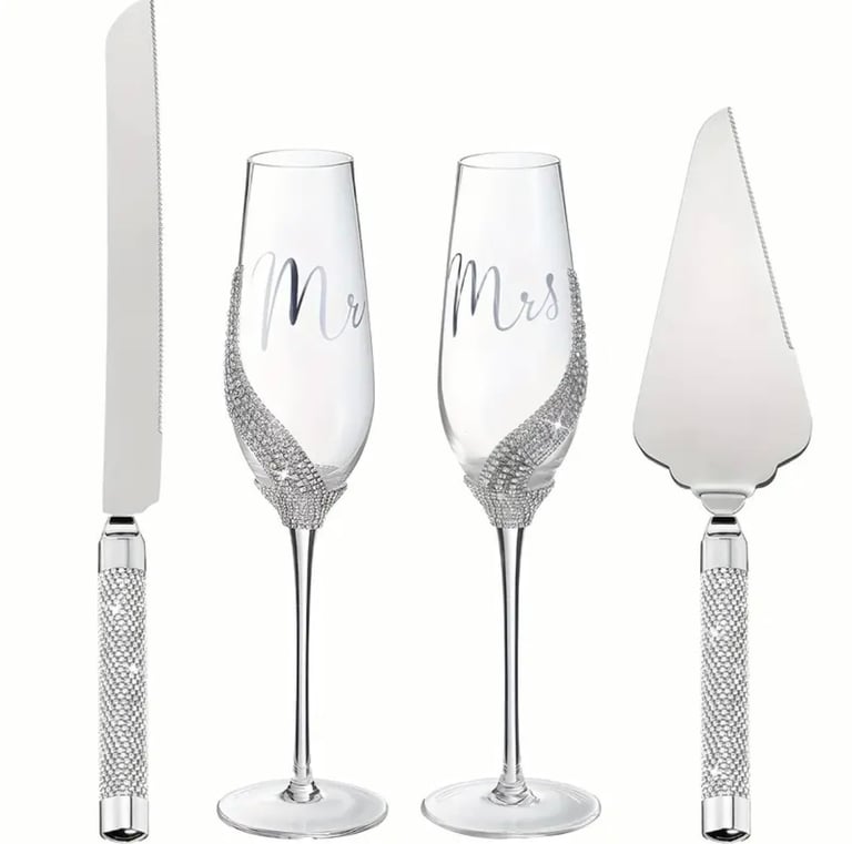 a couple of wine glasses and a knife and knife