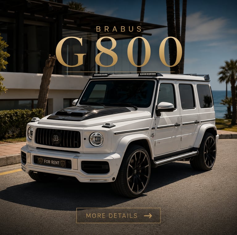 White Brabus G800 luxury SUV parked on a coastal road with palm trees.