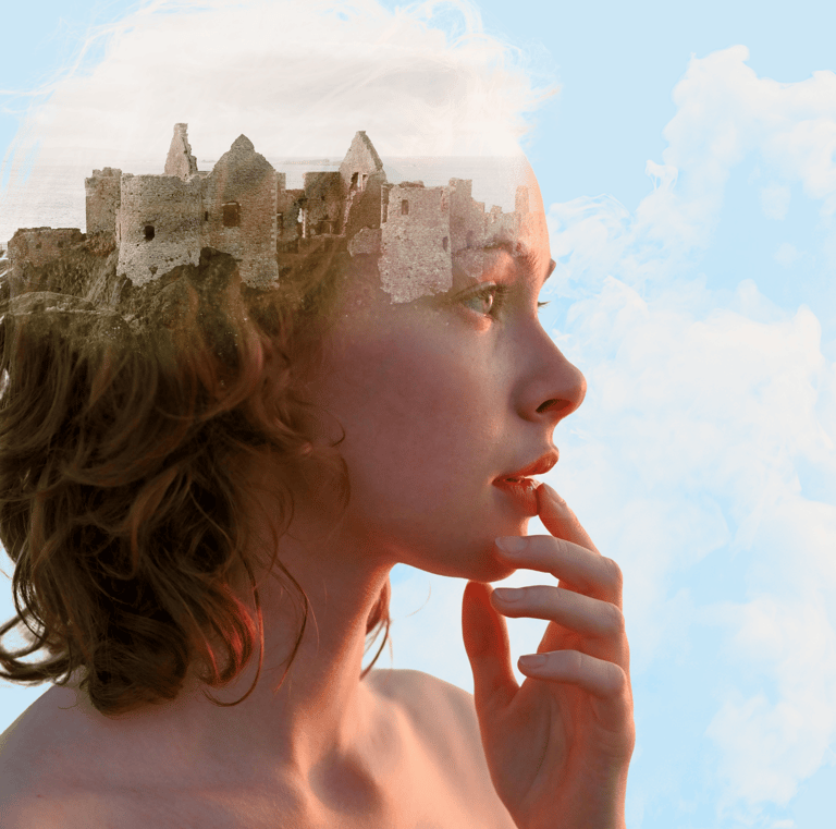 Ethereal double exposure edit of Irish castle over redheaded woman