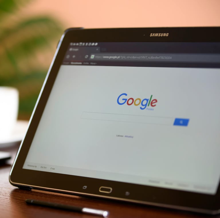 Google search page up on a tablet in an office setting