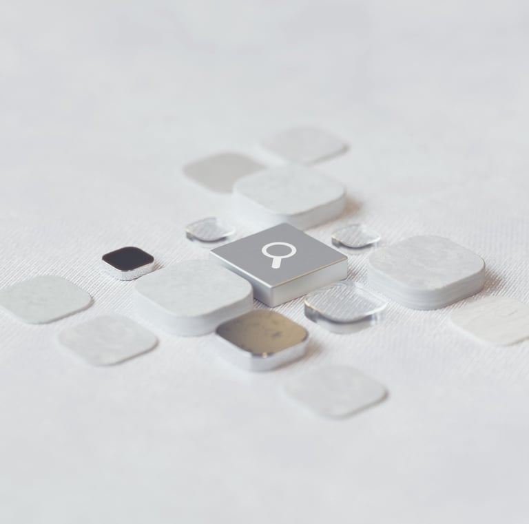 Keyboard keys on a white background, the central one featuring a magnifying glass search icon
