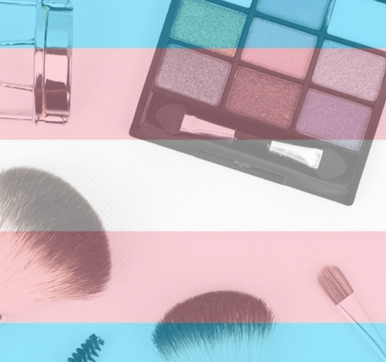 Trans pride colors over makeup palettes and tools