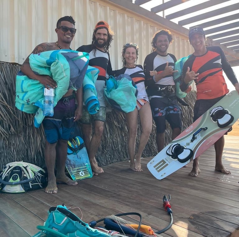 Happy instructors after a great session of kite surfng