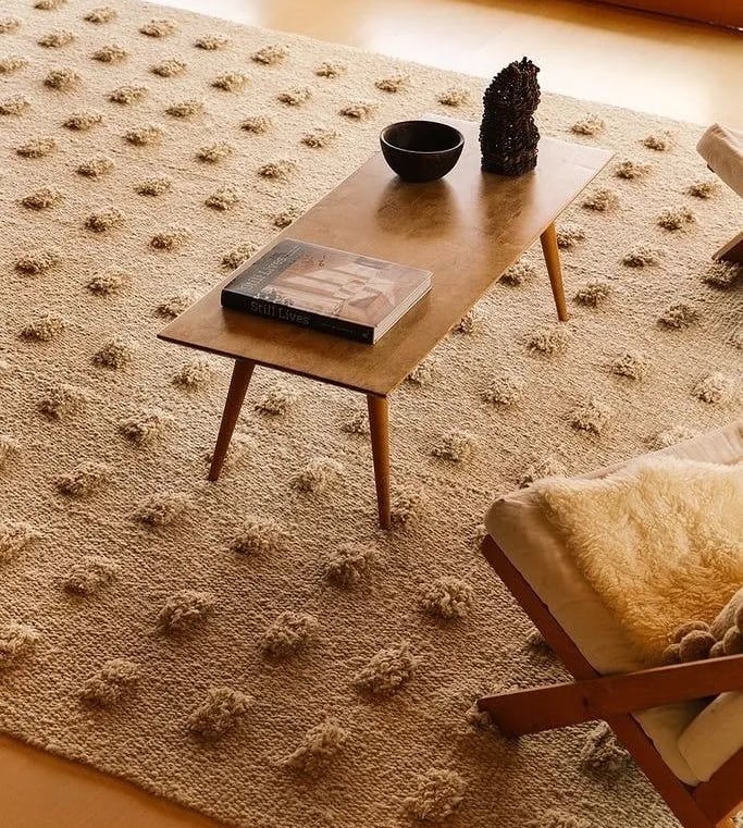 Minimalist modern rug design by Rasida Creation, handmade with care