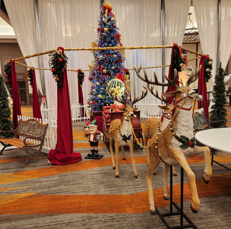a christmas tree with reindeer and reindeer decorations