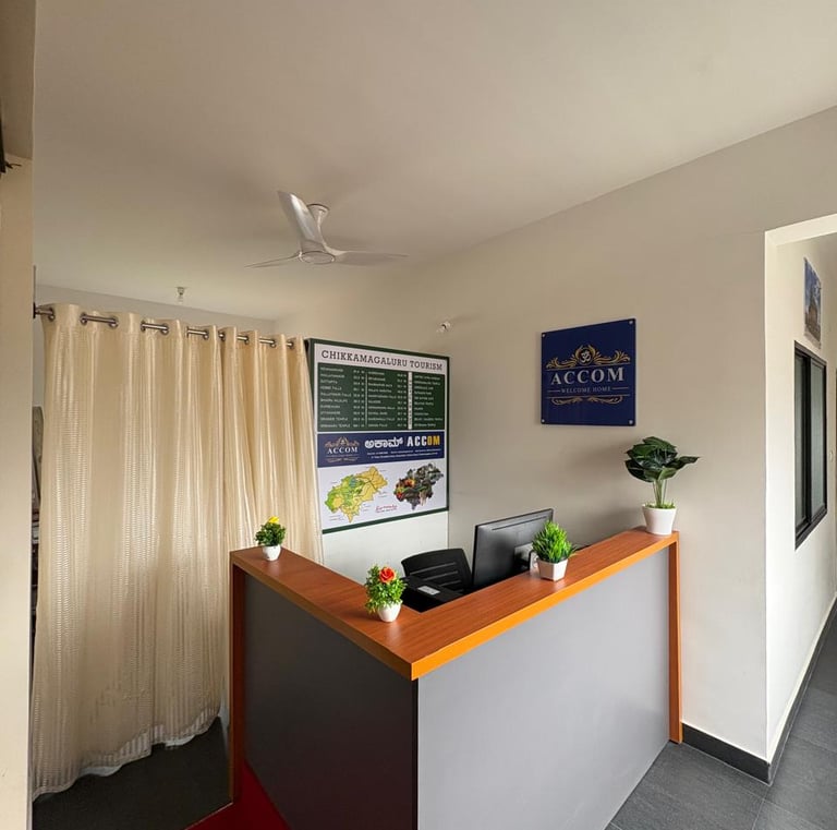 a reception desk with a red carpet and a red carpet
