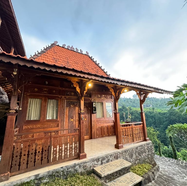 Antique Joglo teak pavilion exterior showcasing traditional Indonesian architecture crafted from reclaimed teak wood