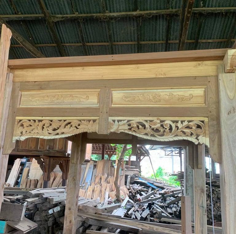 Restoration process of antique Joglo structure preserving original teak wood while preparing for modern installation