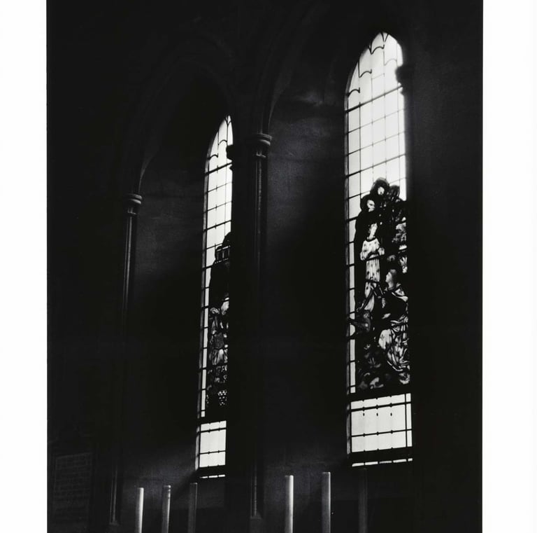 A view from inside the church - a view on two windows lit by an external light. Creator: Slawek Dejneka