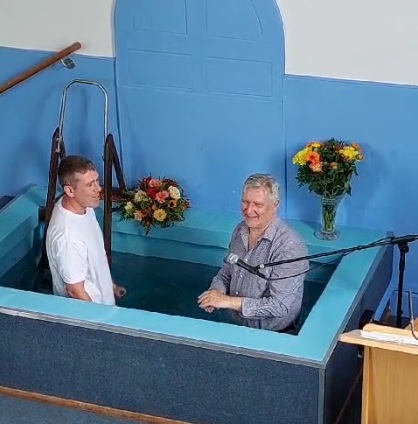 A man being baptised