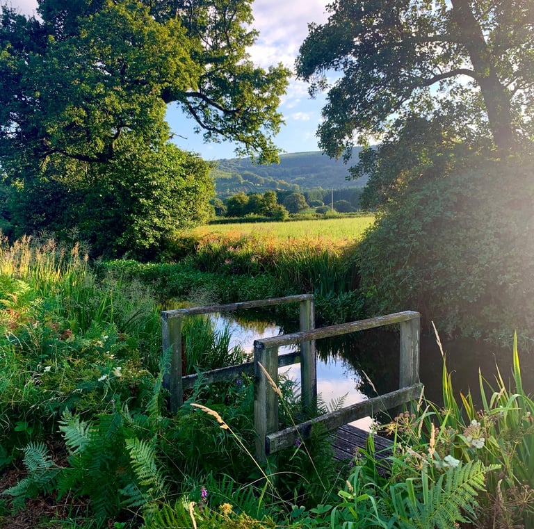 A view across the beautiful Monmouthshire and Brecon canal across to the Brecon Beacons national park.