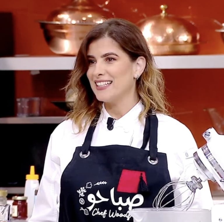 Well-known chef in a unique apron designed just for her
