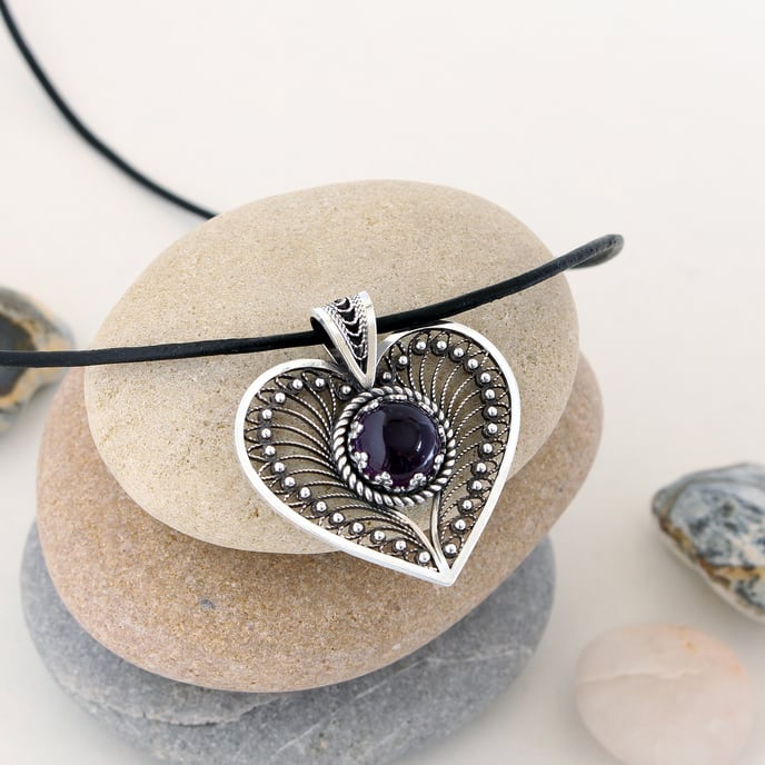 Handmade silver filigree heart pendant with a natural Amethyst gemstone