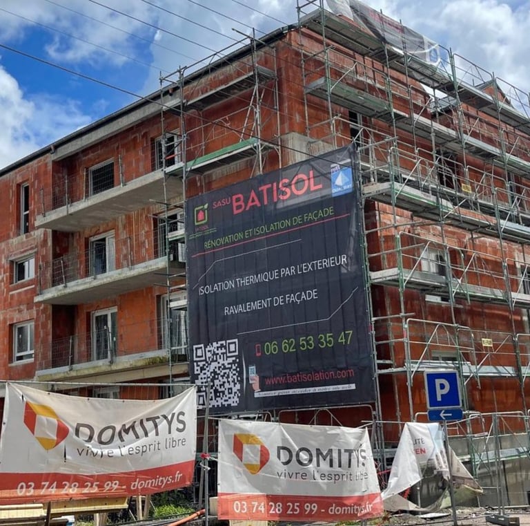 a building with scaffiered signs on it