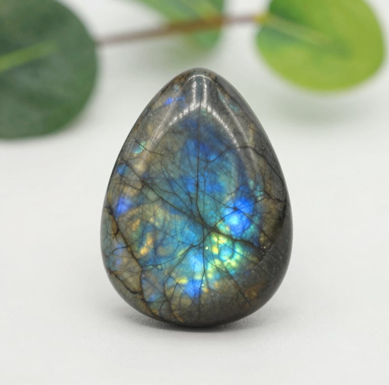 Raw labradorite with flashes of blue and green shimmering colors.