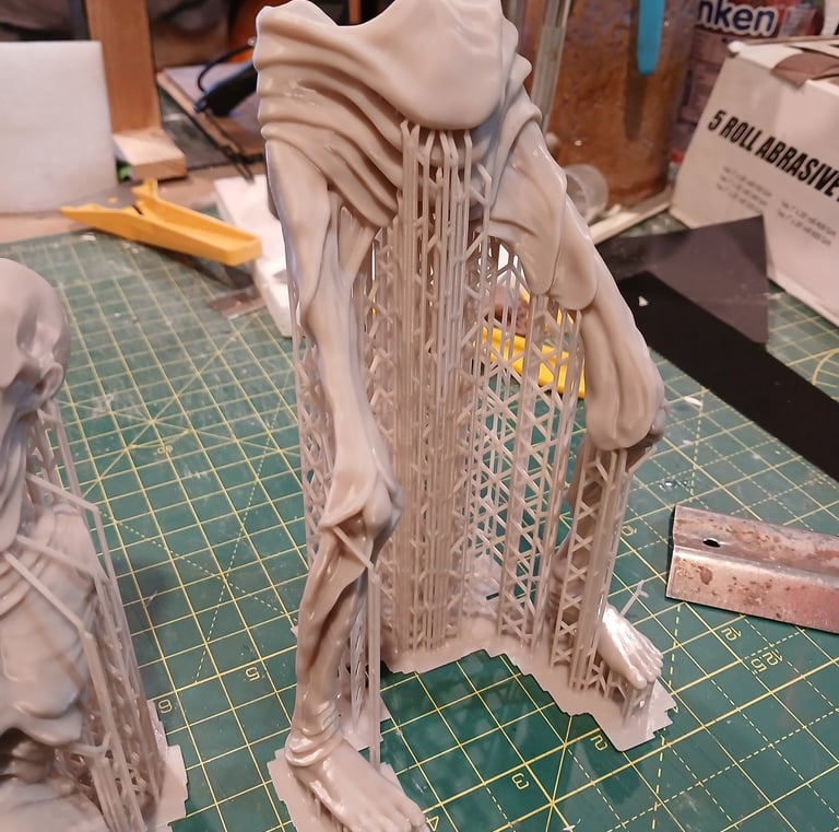 Resin 3D printed character parts with support structures prior to cleaning and finishing