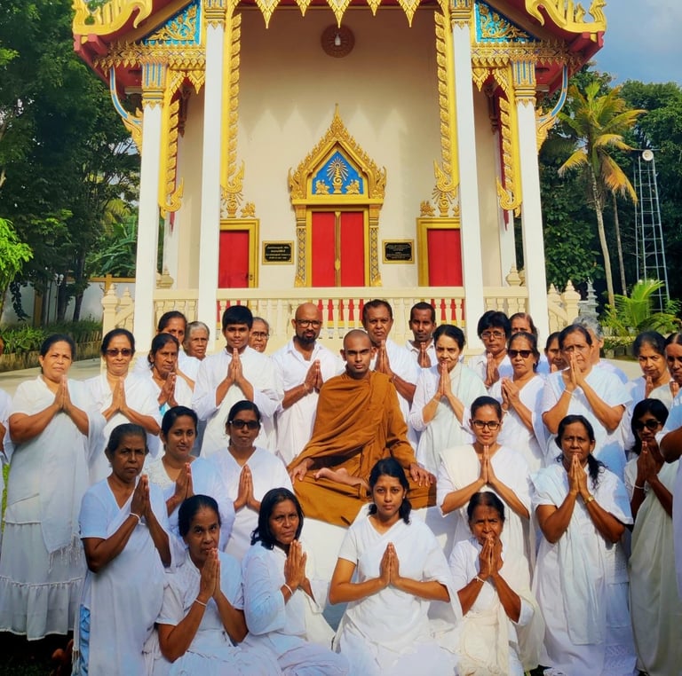 a monk in a white robe and a monk in a white robe