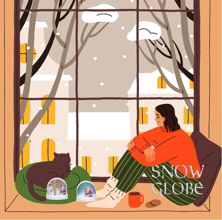 a woman sitting on a couch with a cat in the window with snow globes