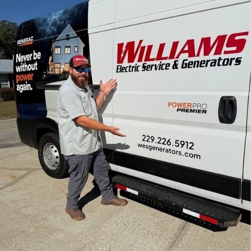 Williams service tech standing next to the service van