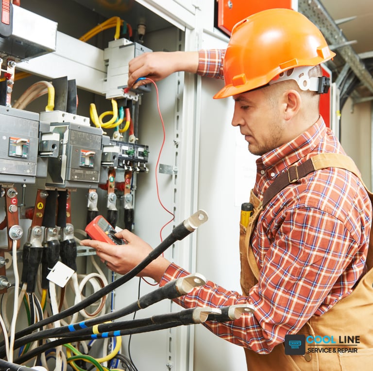 Certified technician performing electrician repair service for a residential home.