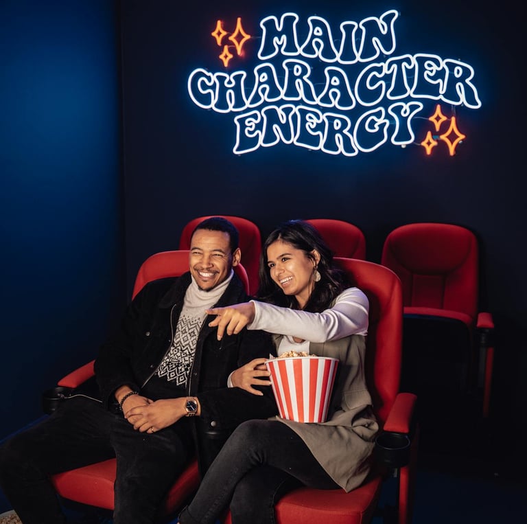 couples enjoying movie at home theatre setup