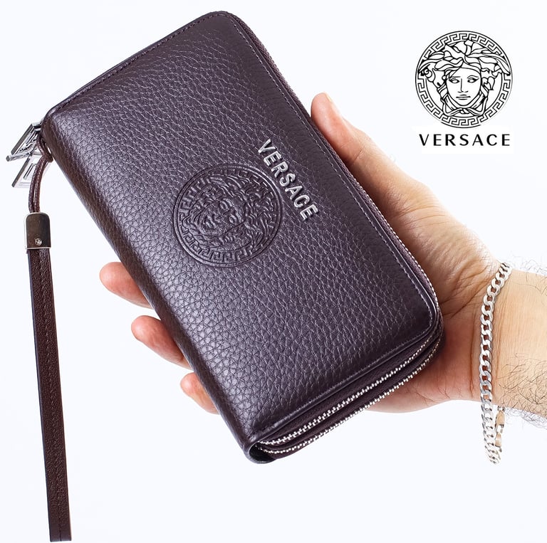 Photo of dark brown textured leather Versace men's wallet with zipper. Luxury fashion KSA.