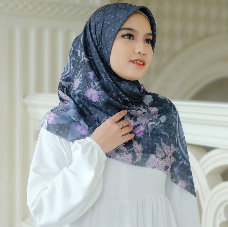 a woman wearing a hijab in a white dress