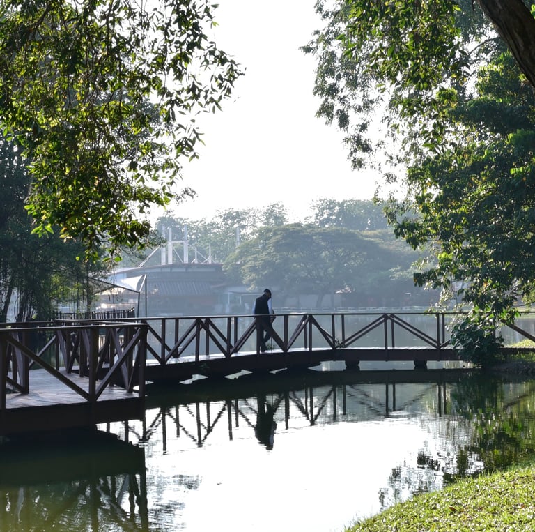 Solitary morning exercise for this well-dressed elderly man at the Shah Alam serene Lake Gardens
