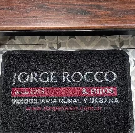 Felpudo personalizado con logo inmobiliaria rocco