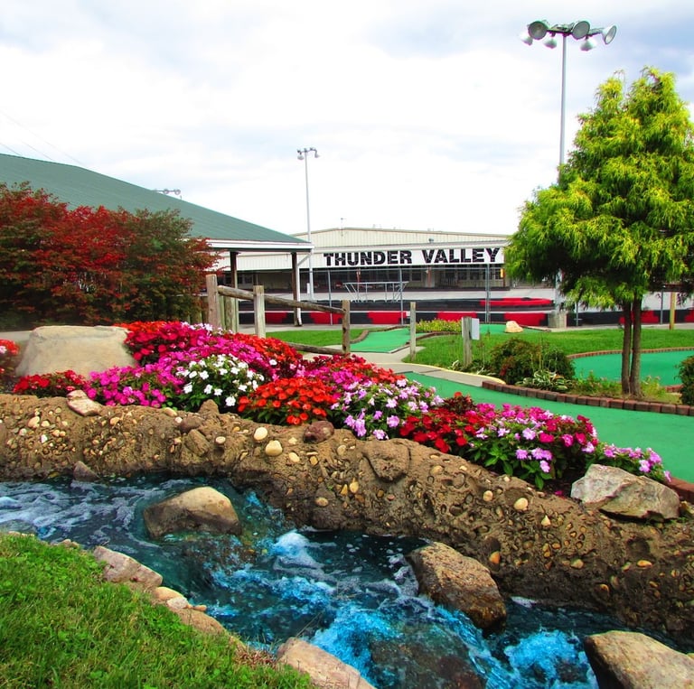 mini golf course with Thunder Valley sign in background 