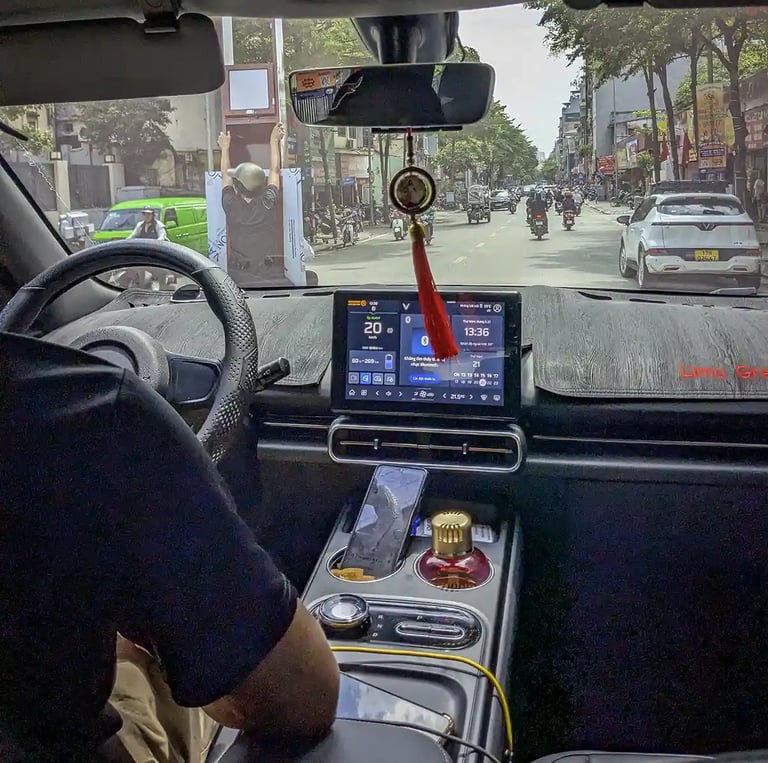 View from taxi inside Hanoi during extreme afternoon heat in Vietnam